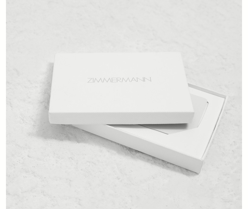 a white Zimmermann gift card in its box 