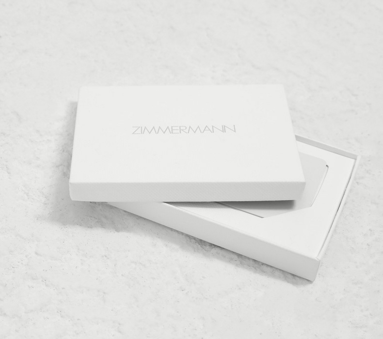 a white Zimmermann gift card in its box 