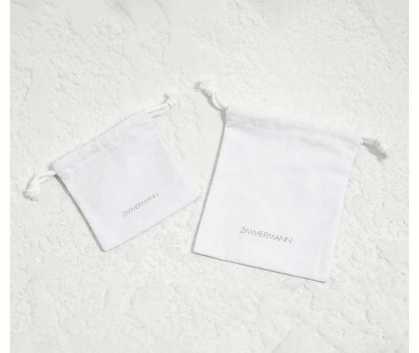 AN IMAGE OF WHITE  ZIMMERMANN DUST BAGS