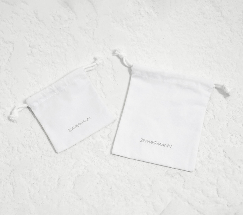 AN IMAGE OF WHITE  ZIMMERMANN DUST BAGS