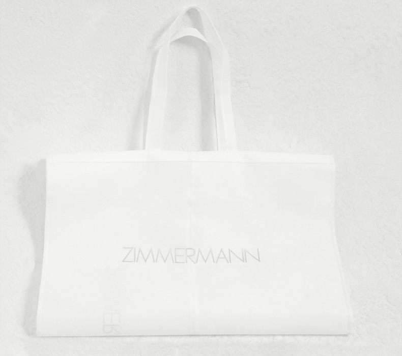 an image of a white Zimmermann garment bag 