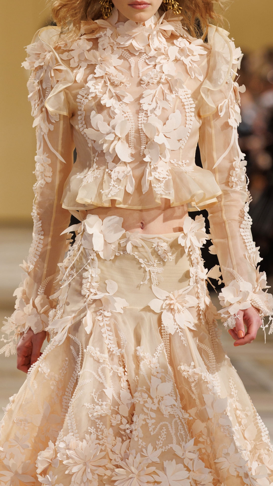 Look 50: Hypnotic Applique Bodice in Cream, Hypnotic Applique Midi Skirt in Cream, Whimsy Chandeliers in Antique Gold and Helix Sandal 75 in Wheat 