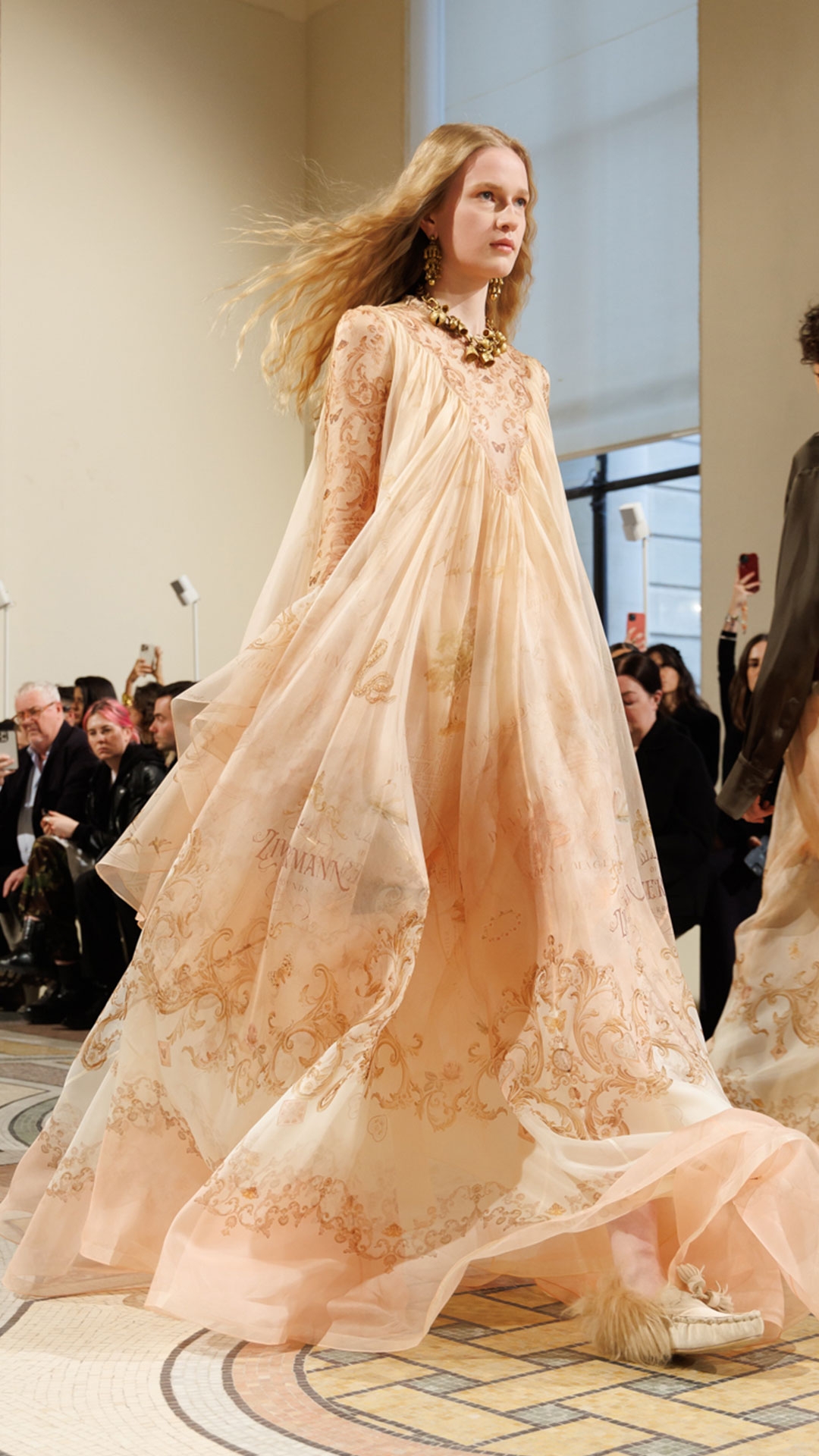Look 17: Hypnotic Maxi Dress in Map Print, Whimsy Chandeliers in Antique Gold, Whimsy Charm Necklace in Antique Gold, Whimsy Charm Bracelet in Antique Gold, Aspen Loafer in Ecru and Wavelength Top Handle in Biscuit 