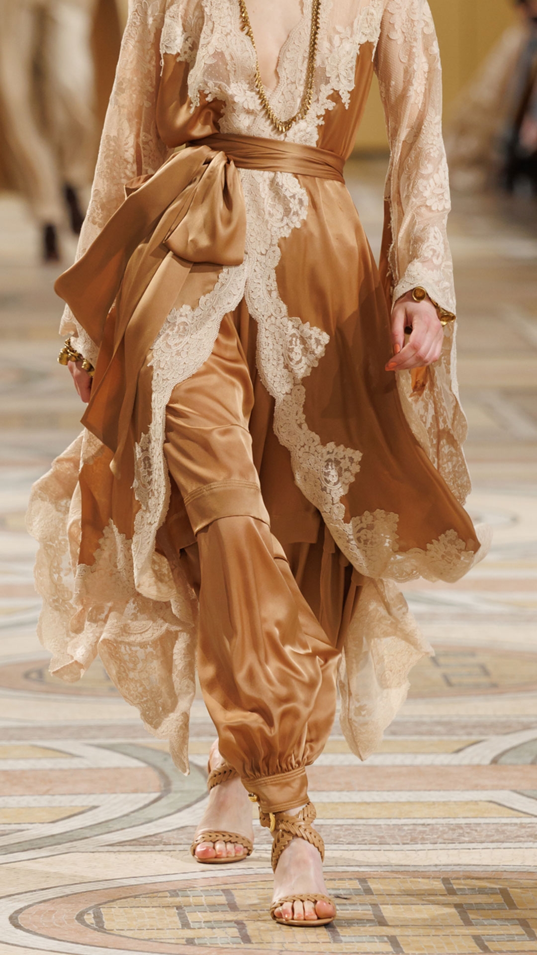 Look 2: Hypnotic Satin Wrap Dress in Biscuit, Hypnotic Silk Harem Pant in Biscuit, Whimsy Chandeliers in Antique Gold, Whimsy Single Earcuff in Antique Gold, Whimsy Necklace, Whimsy Charm Bracelet, Helix Sandal 75 in Wheat and Miranda Oversize in Orange 