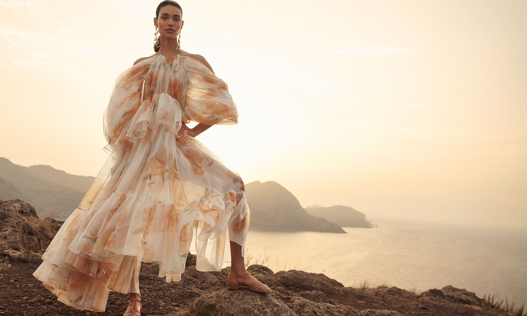 Model wears the Natura Gathered Midi Dress in Ivory Camellia, Zimmermann Celesta Ballerina in Peach and Zimmermann Midnight Chandelier in Gold 