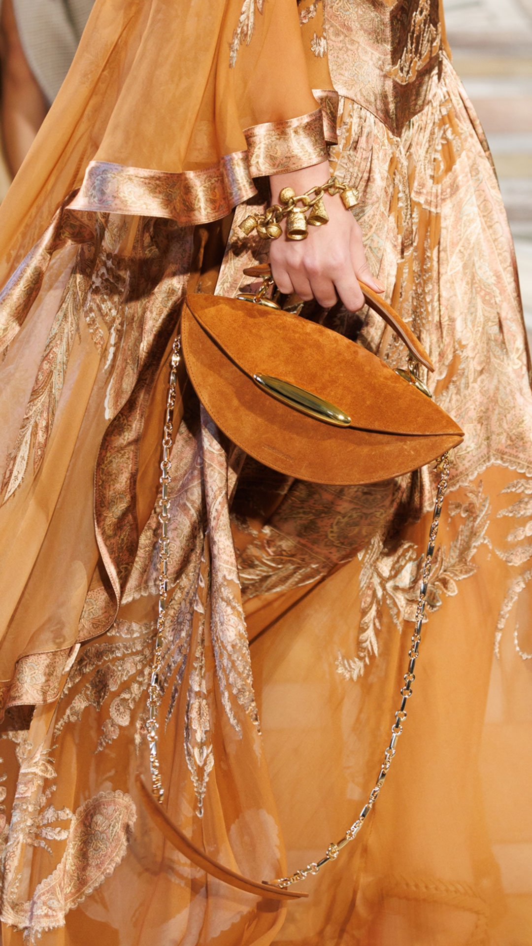 Look 28: Memento Burnout Dress in Caramel Paisley, Whimsy Chandeliers in Antique Gold, Whimsy Charm Bracelet in Antique Gold, Helix Sandal 75 in Wheat and Wavelength Top Handle in Tan 