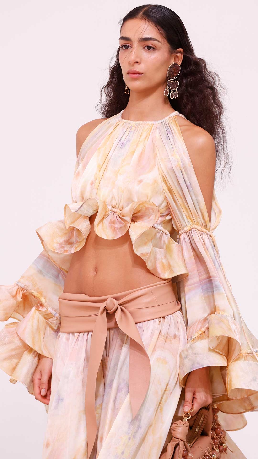 Look 13: Balance Flounce Blouse in Honey Agate, Balance Flounce Maxi Skirt in Honey Agate, Ore Chandeliers in Gold/Copper, Foam Wrap Belt in Caramel, Foam Bag in Caramel and Wild Sandal in Caramel 