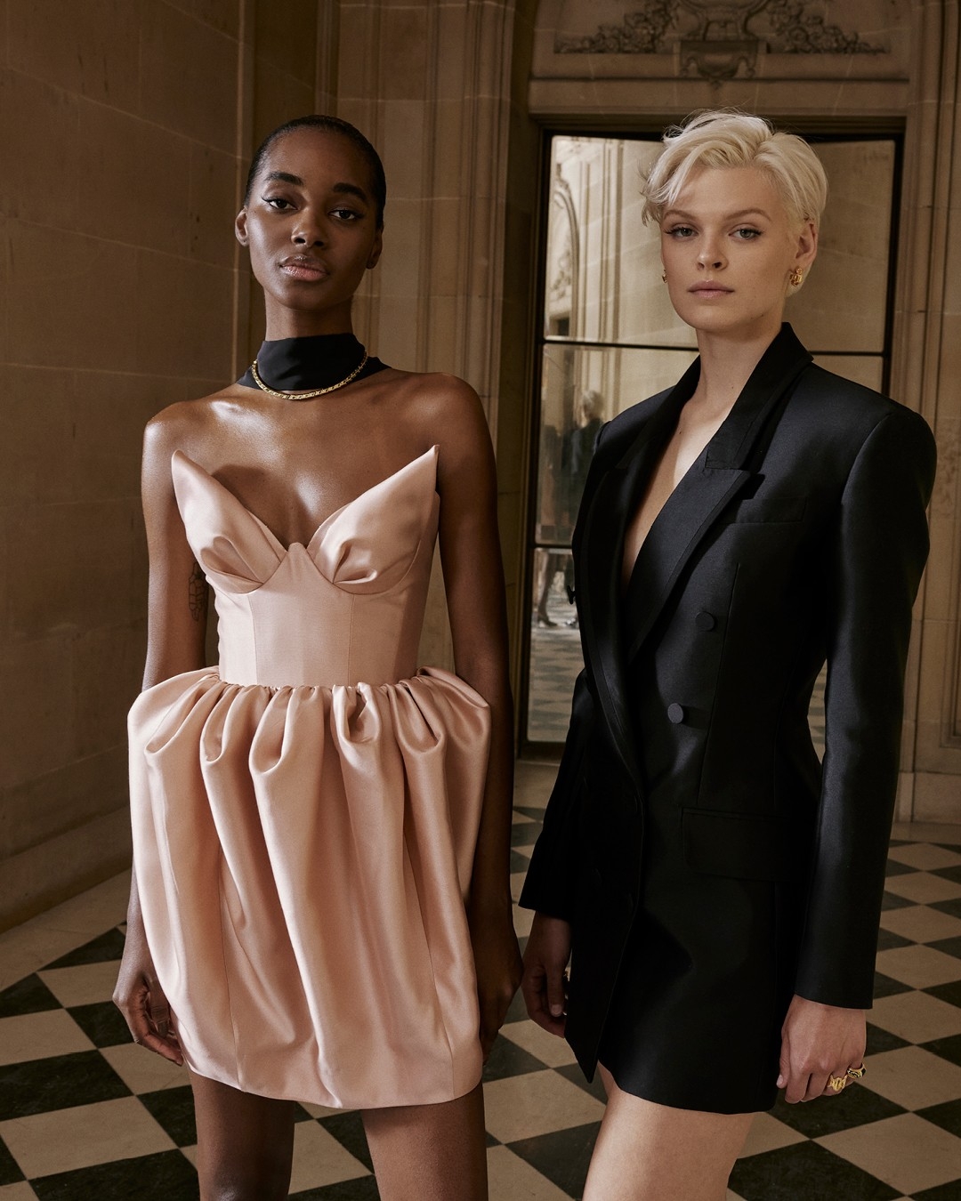 Tami Williams in look 32 and Cara Taylor in look 33 