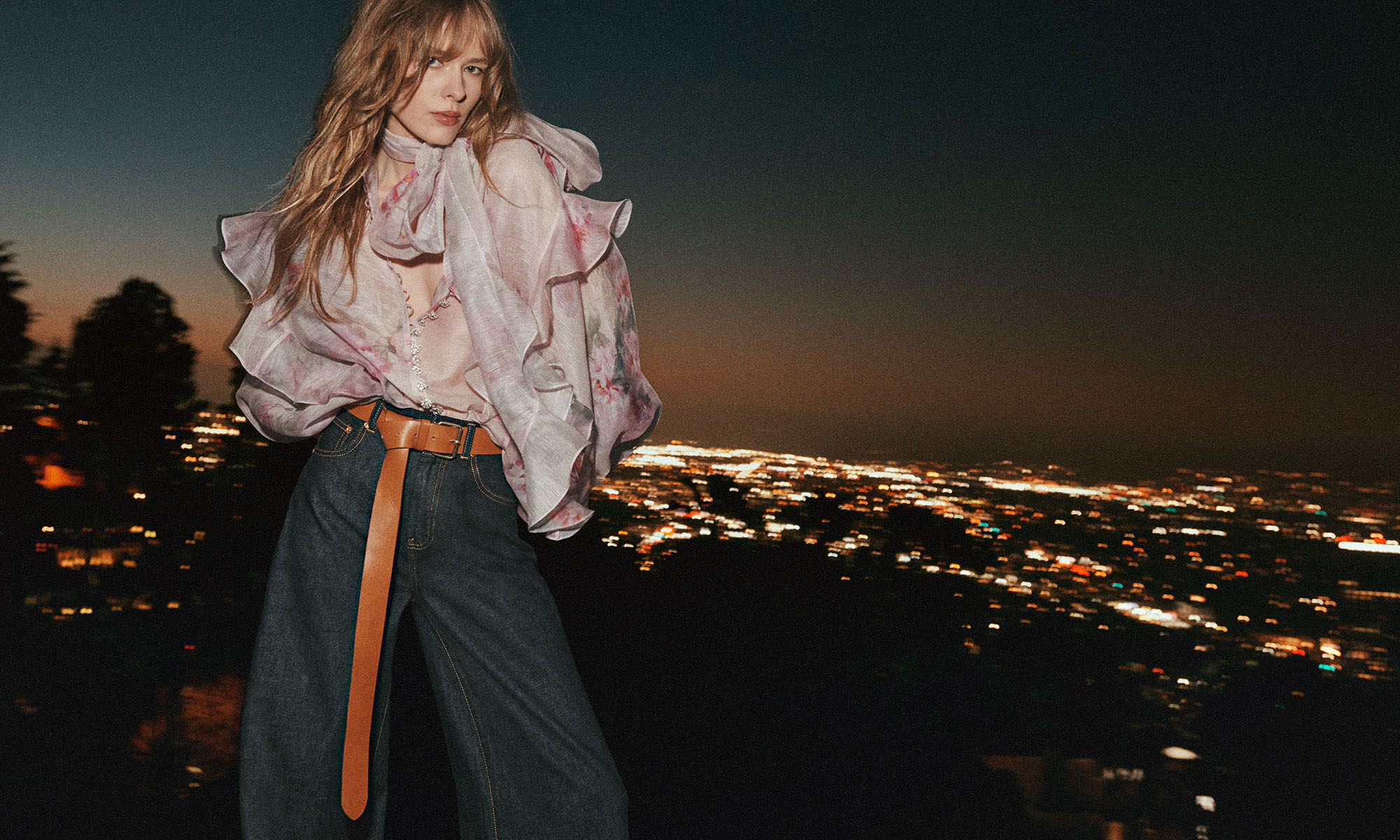 Model wears the Crush Tie Neck Ruffle Blouse in Pink Floral, Crush Straight Jean in Night Sky and Long Belt 40 in Tan 