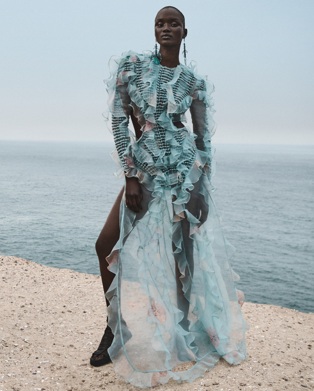 OUR MODEL WEARS THE ILLUMINATE BRAIDED MAXI DRESS FROM OUR SPRING RTW 25 COLLECTION