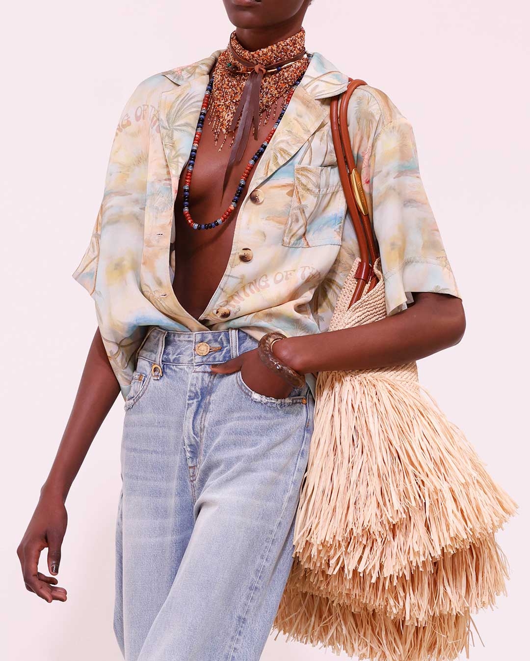 Look 9: Illuminate Short Sleeved Shirt in Blue Morning, Illuminate Relaxed Flare Jean in Sea Foam, Mellow Pearl Beaded Necklace, Mellow Stone Beaded Necklace, Mellow Stone Necklace, Slip Cuff, Goldentime Large Fringe Tote and Wild Sandal in Espresso 
