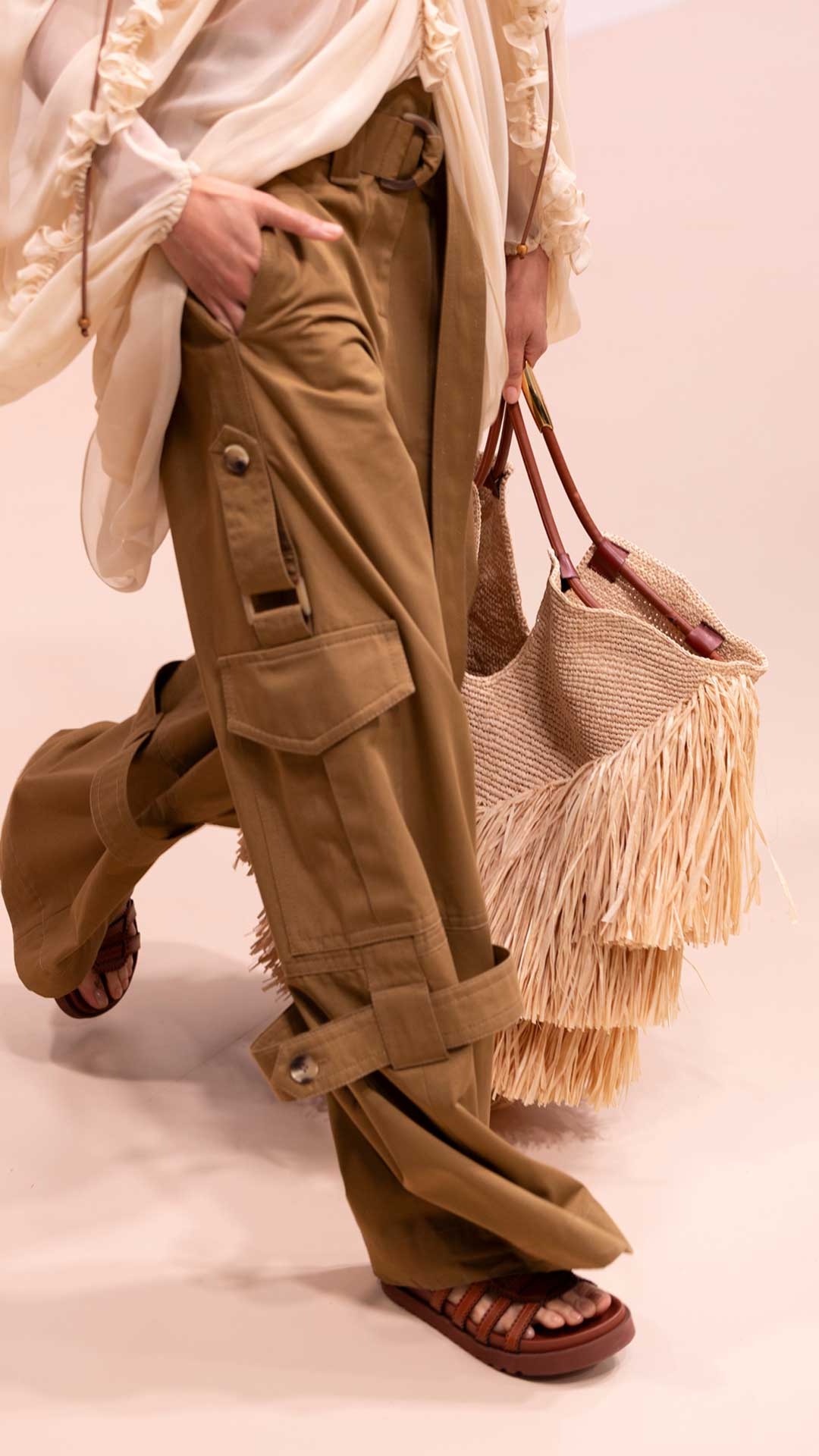 Look 4: Illuminate Draped Blouse in Tea, Illuminate Cargo Pant in Khaki, Mellow Pearl Beaded Necklace in Gold/Multi, Beaded Bandana Scarf in Orange/Brown, Goldentime Large Fringe Tote in Natural and Goldie Gladiator in Pecan 