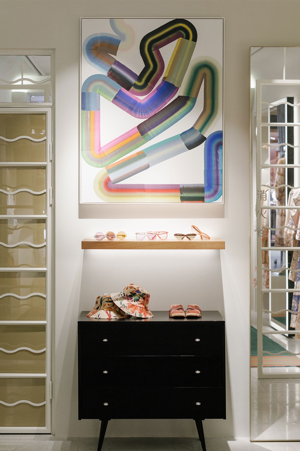 Custom hanging wall art and dresser in our ZIMMERMANN Shanghai store, Light Speed by Belem Lett 