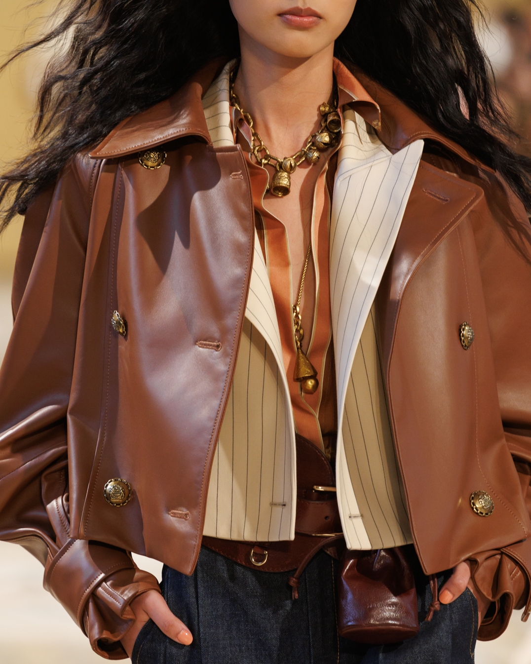 Look 6: Hypnotic Leather Crop Trench in Tan, Hypnotic Pinstripe Blazer in Cream Pinstripe, Hypnotic Stripe Shirt in Pecan Stripe, Hypnotic Denim Tailored Pant in Night Sky, Helix Belt 100, Helix Sandal 75 & Miranda Oversize 