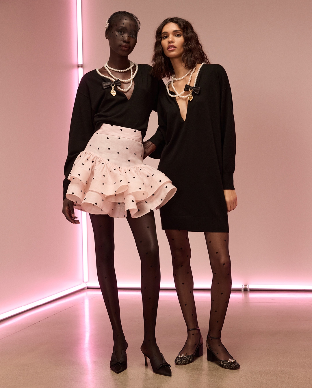 Adit Priscilla in Look 17 and Barbara Valente in Look 15 