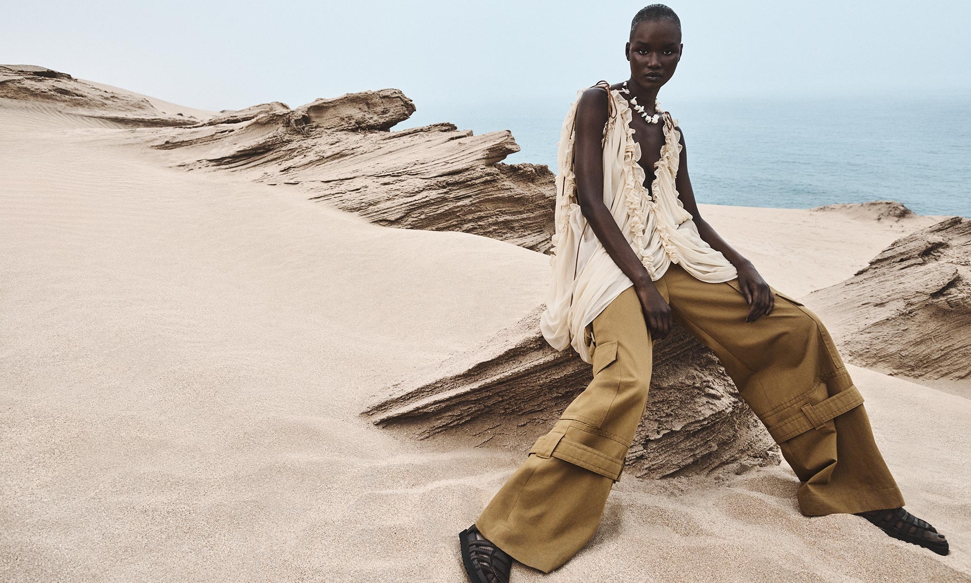 Model wears the Illuminate Draped Blouse in Tea, Illuminate Cargo Pant in Khaki, Goldie Gladiator in Espresso and Mellow Pearl Beaded Necklace in Gold/Multi 