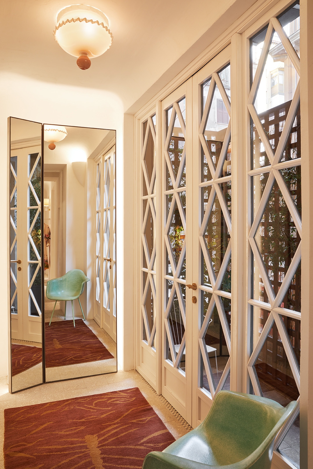 Glass doors to a courtyard in our Rome boutique 