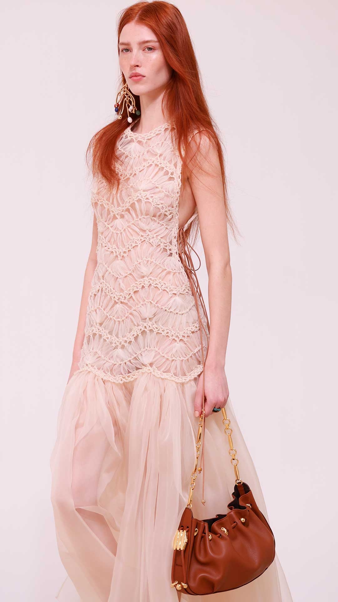 Look 29: Illuminate Macrame Maxi Dress in Cream, Mellow Chandeliers in Gold/Multi, Slip Band Ring in Copper Patina, Slip Band Ring in Tiger’s Eye, Halcyon Clutch in Tan and Goldie Gladiator in Pecan 