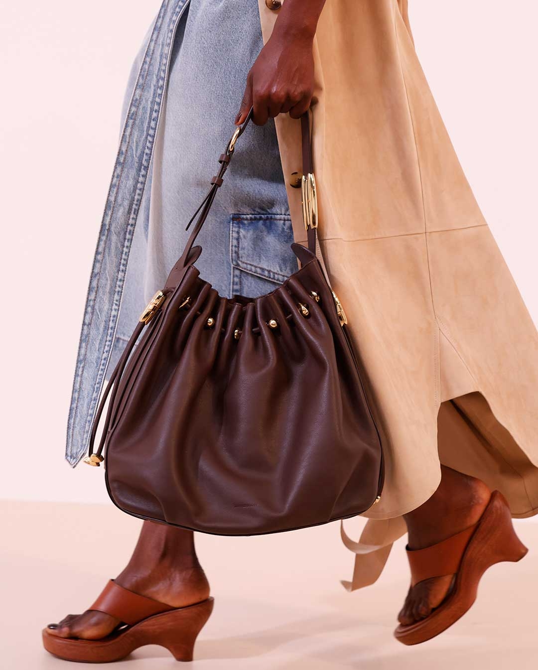 Look 30: Illuminate Suede Trench in Sand, Dawning Scoop Bodysuit in Rust, Illuminate Denim Cargo Short in Sea Foam, Leather Headband in Coffee, Mellow Pearl Beaded Necklace, Mellow Stone Necklace, Halcyon Large Bucket in Coffee and Wild Wedge 95 in Pecan 