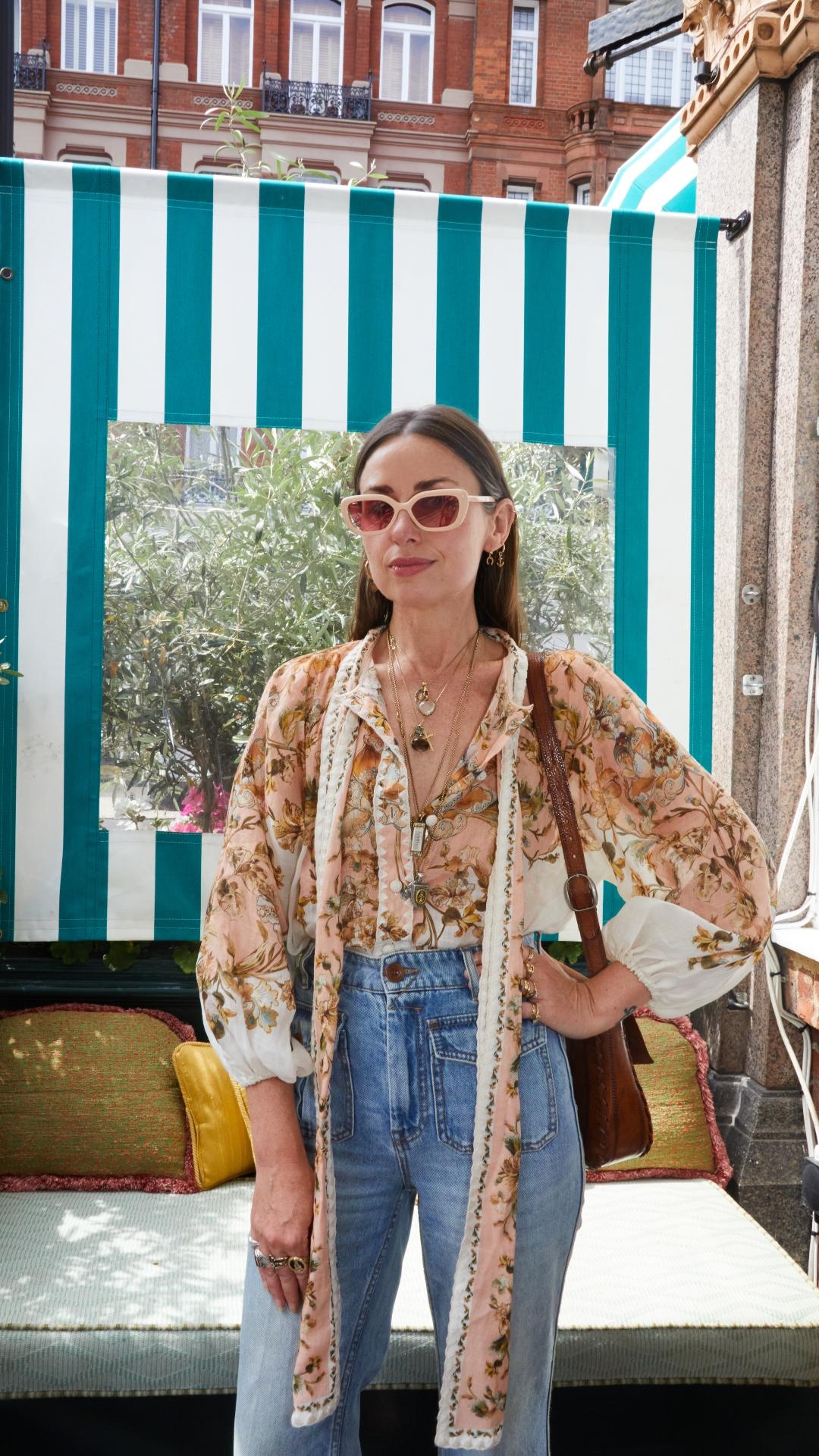 Aldene Johnson in the Chintz Tie Neck Blouse and Raie Cropped Flare Jean  