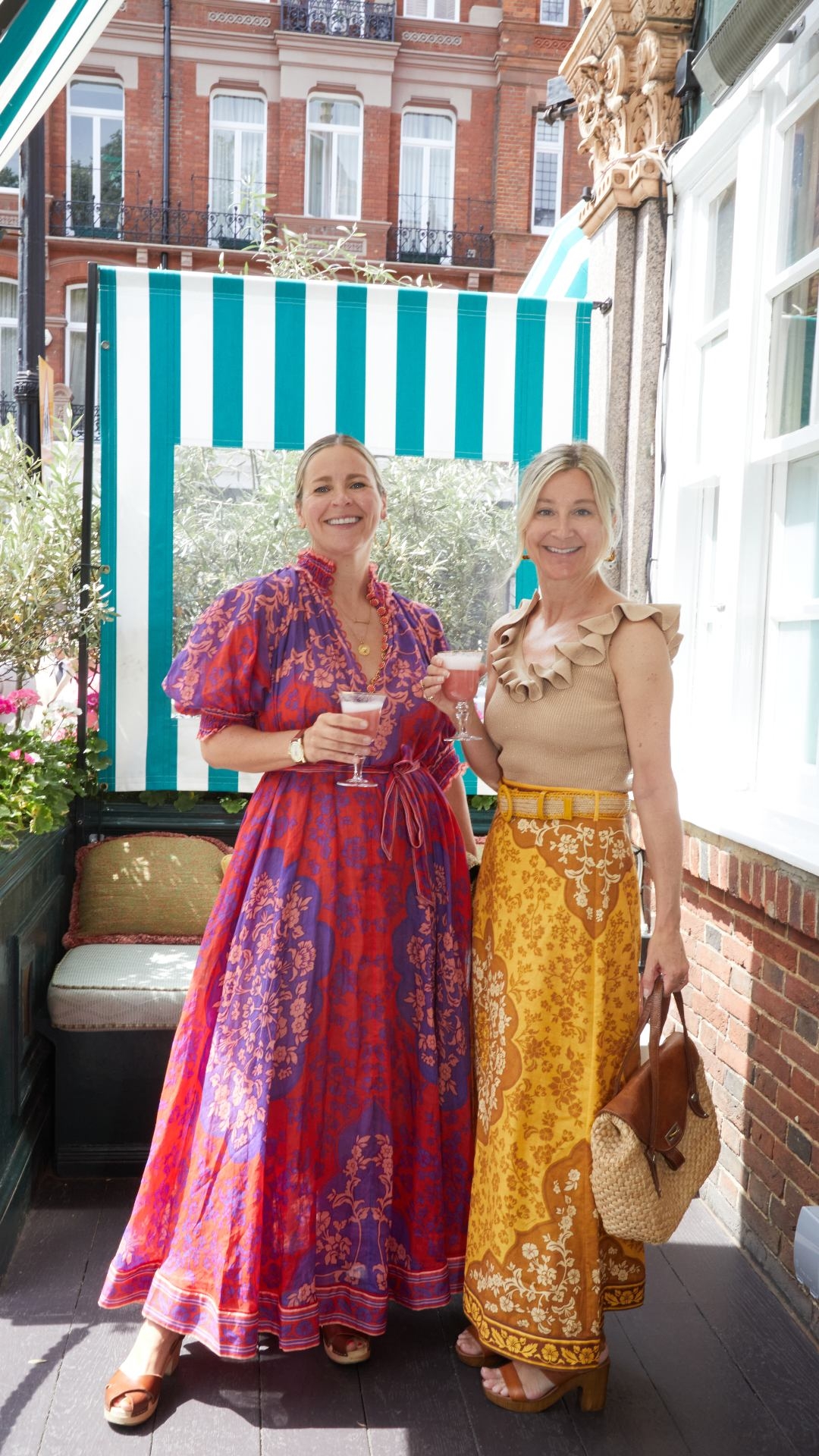 Sarah Tomczak in the Raie Swing Maxi Dress and Oongah Brennan Devi Frill V-Neck Top and Raie Column Midi Skirt  