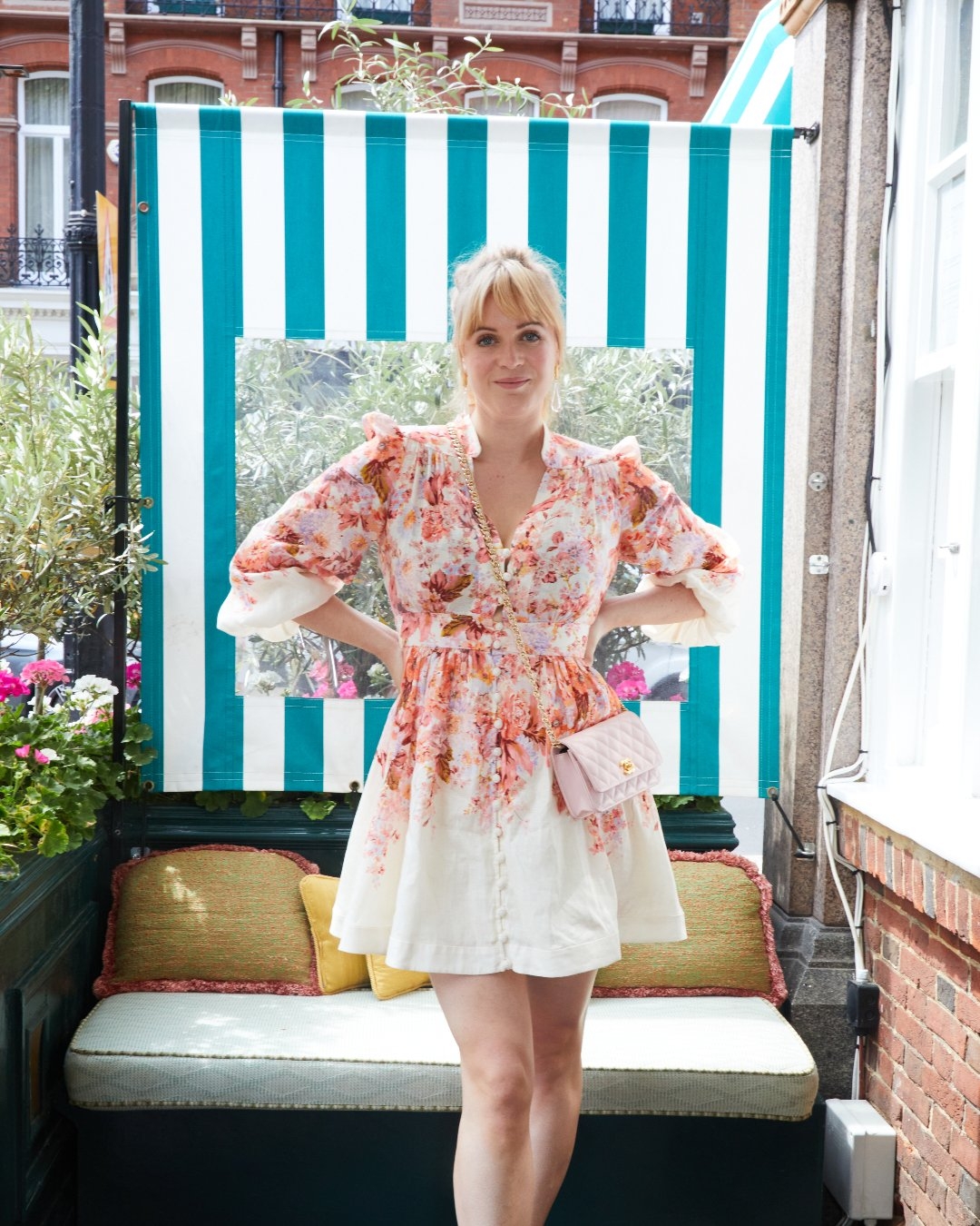 Dolly Alderton in the Devi Plunge Mini Dress  