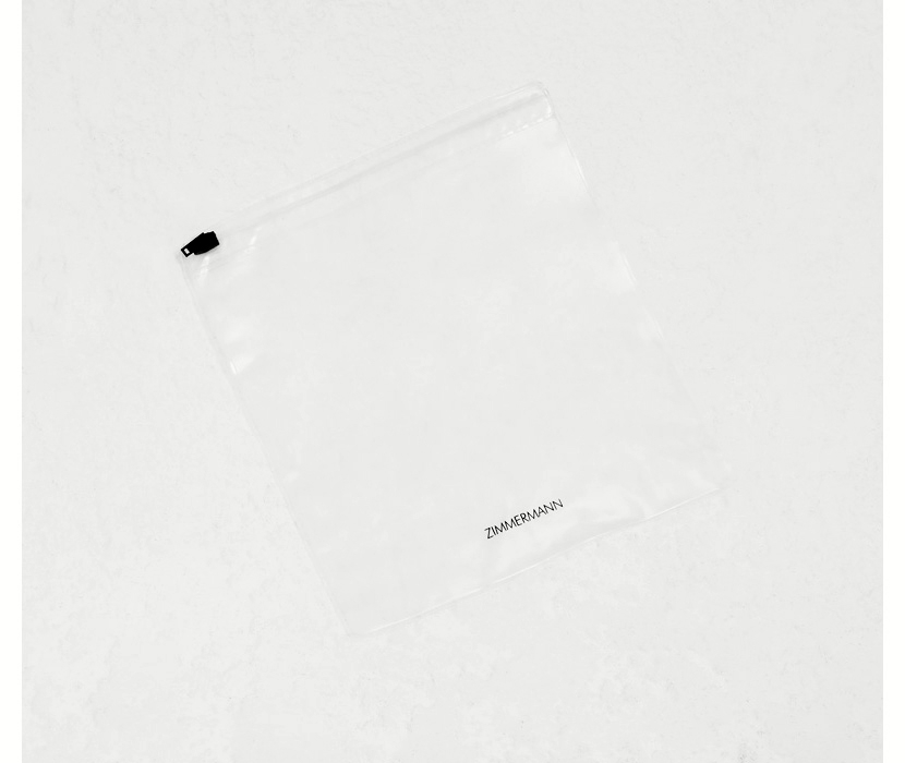 AN IMAGE OF WHITE SHOE BOX WITH ZIMMERMANN LOGO 