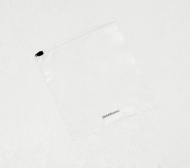 AN IMAGE OF WHITE SHOE BOX WITH ZIMMERMANN LOGO 