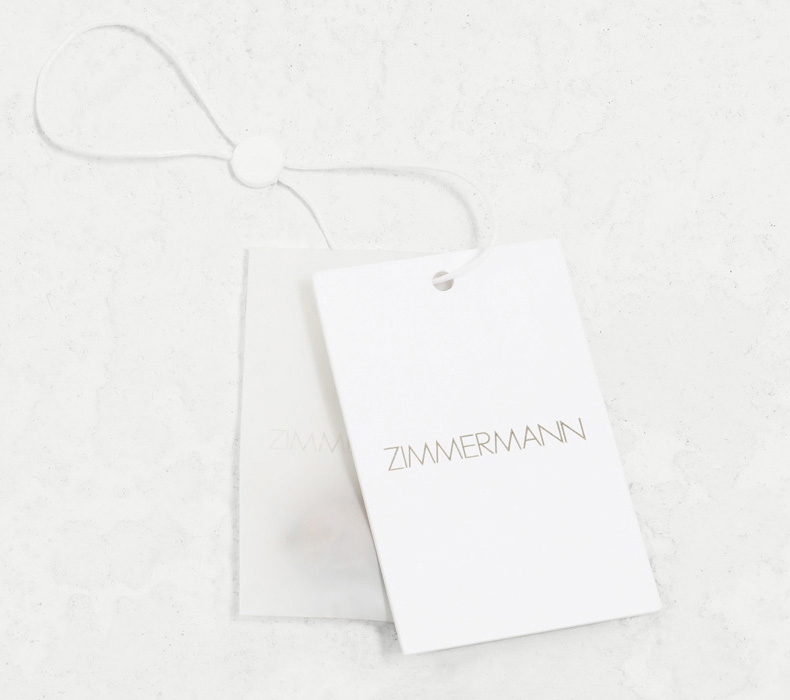 AN IMAGE OF WHITE SHOE BOX WITH ZIMMERMANN LOGO 