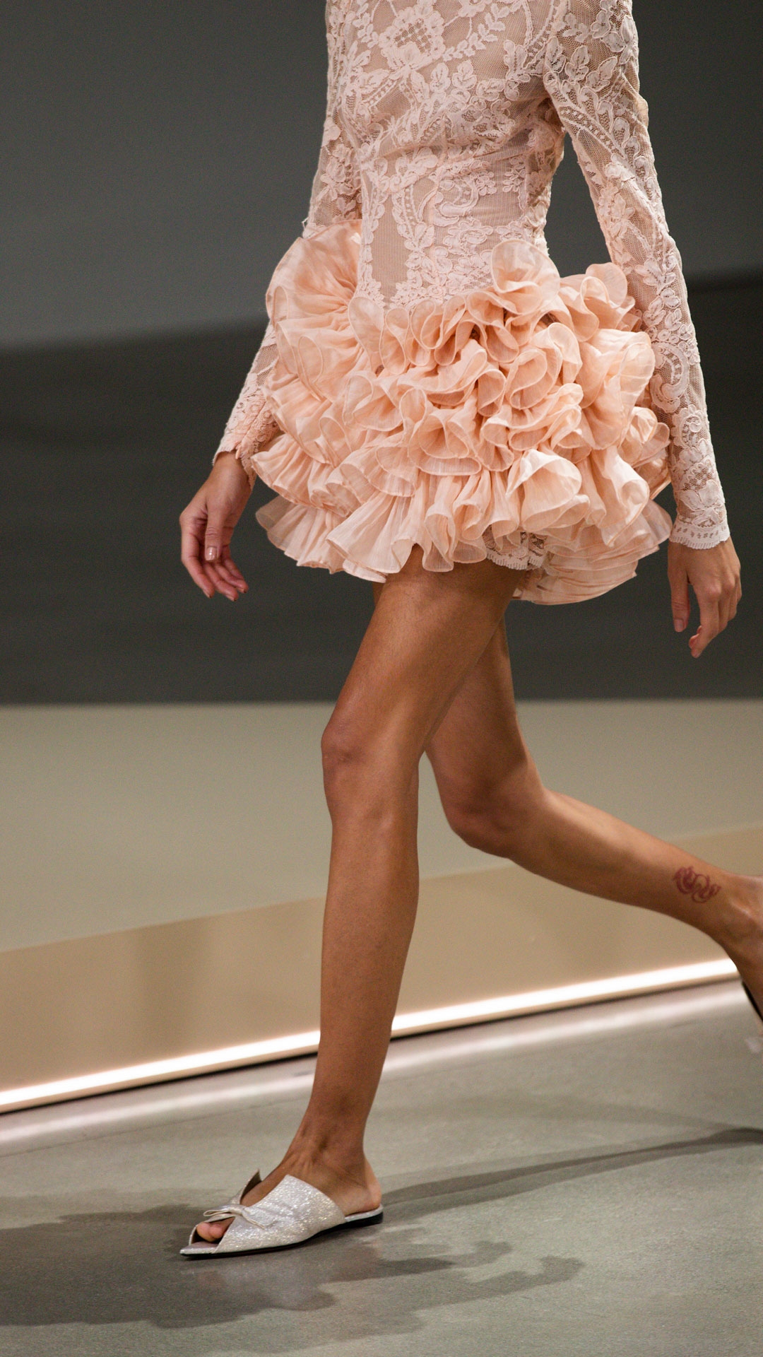 LOOK 38: CRUSH LACE FRILL MINI DRESS IN PEACH, ZIMMERMANN NOVA FRINGE STUDS IN GOLD, ZIMMERMANN WISH NECKLACE IN GOLD/PEARL BLACK CORD AND ZIMMERMANN TUX MULE IN GOLD 