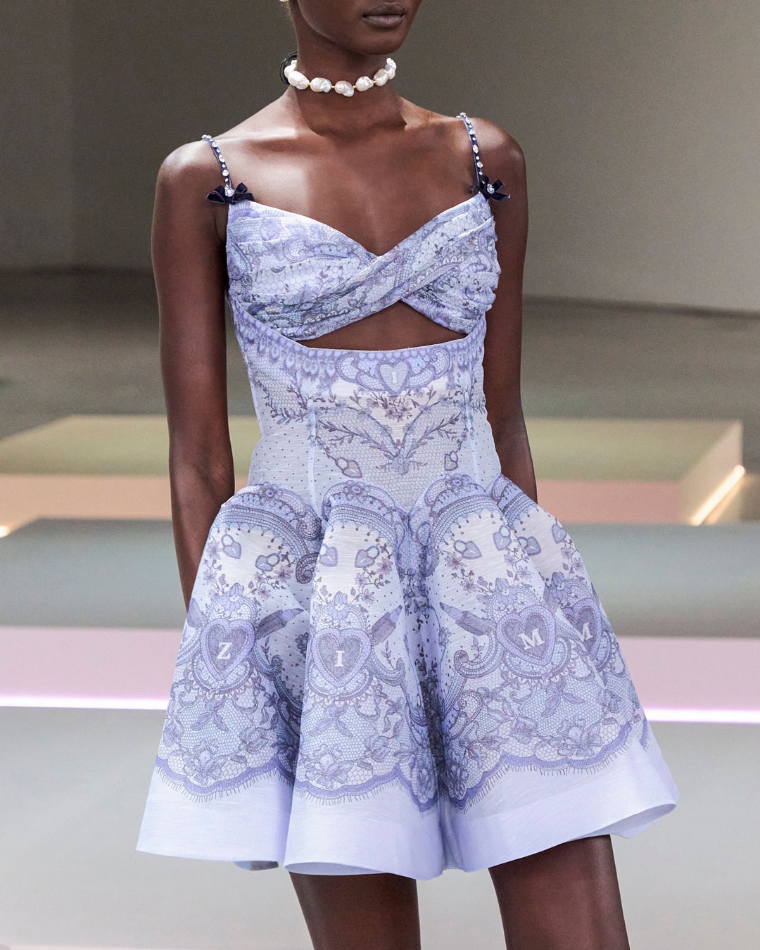 LOOK 11: CRUSH TWIST FRONT MINI DRESS IN BLUE LACE PRINT, ZIMMERMANN NOVA PAVE STUDS IN GOLD/PEARL, ZIMMERMANN WISH NECKLACE IN GOLD/PEARL AND BLACK CORD ZIMMERMANN TUX MULE IN BALLET PINK 