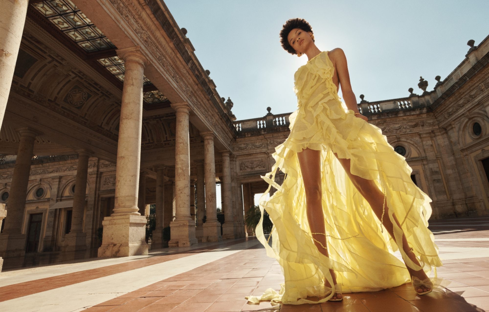 The Wonderland Ruffle Gown in Lemon, Twisted Rope Cuff in Gold and Jelly Bow Wedge 85 in Lemon 