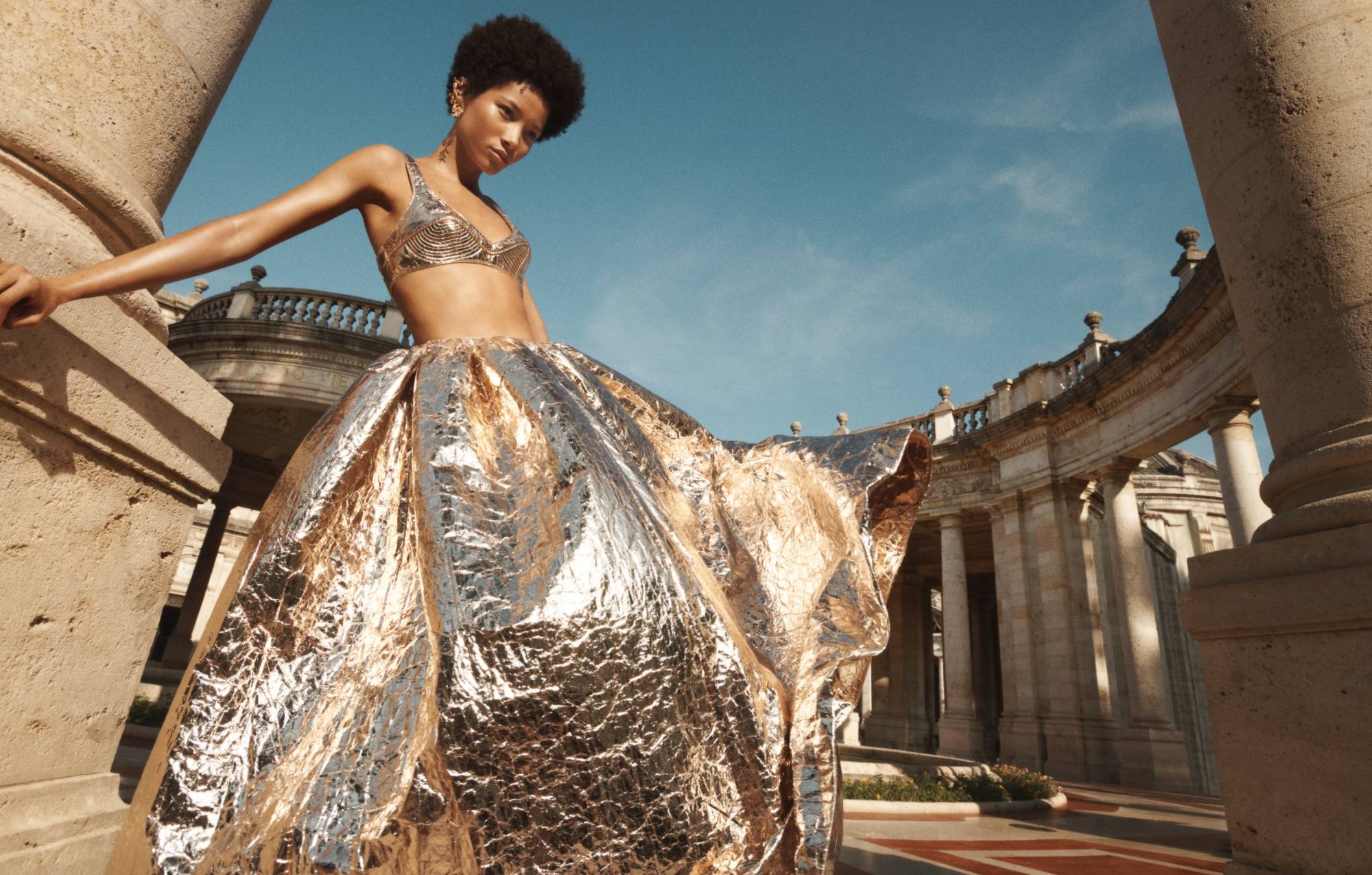 The Coaster Foil Bralette in Gold, Coaster Foil Maxi Skirt in Gold and Large Floral Ear Cuff in Gold 