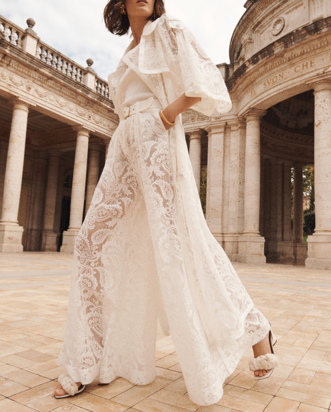 Model wears cropped bodice and tiered skirt in Sienna 