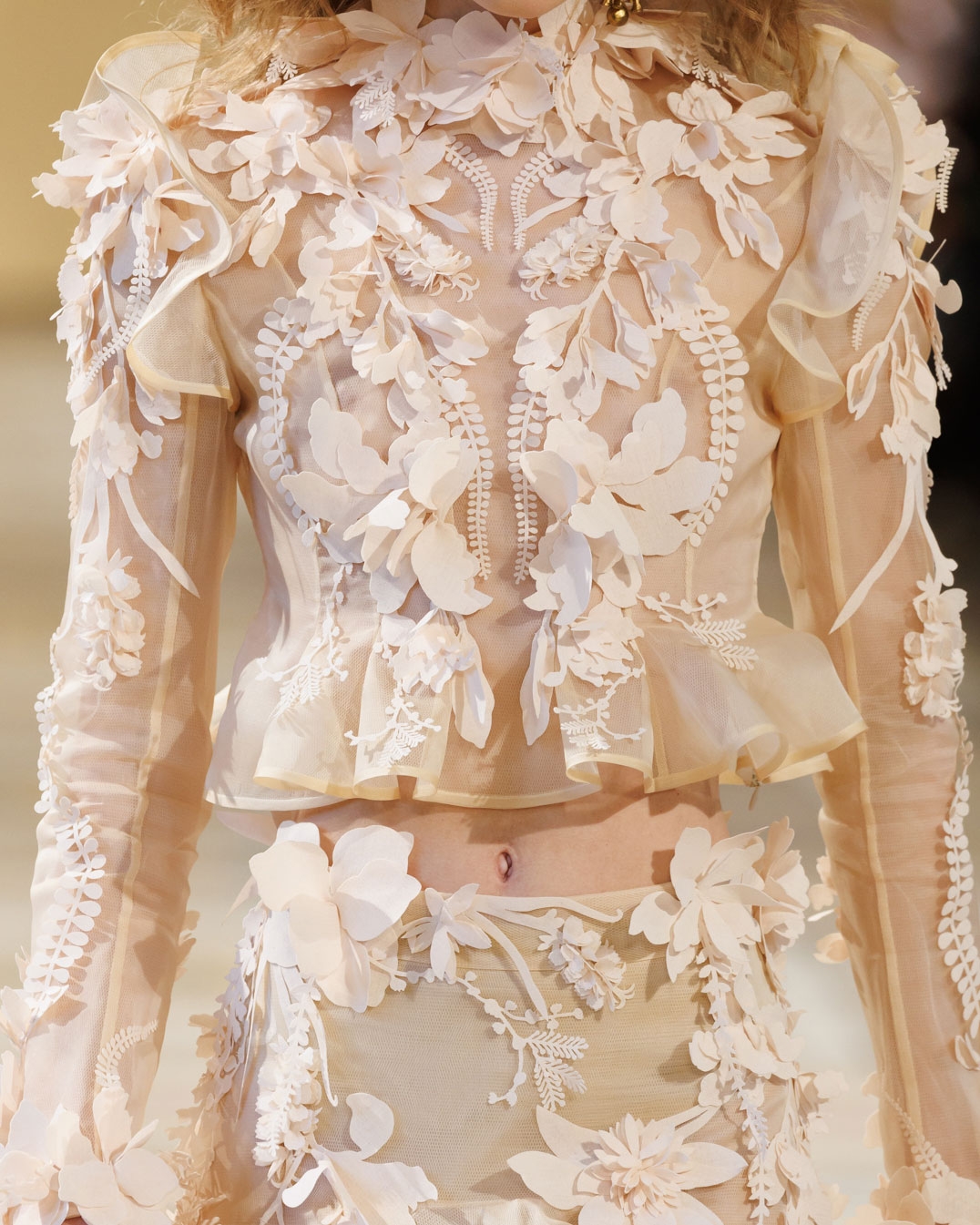Look 50: Hypnotic Applique Bodice in Cream, Hypnotic Applique Midi Skirt in Cream, Whimsy Chandeliers in Antique Gold and Helix Sandal 75 in Wheat 